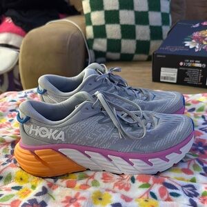 Hoka Gray and Orange Gaviota 4 shoes
